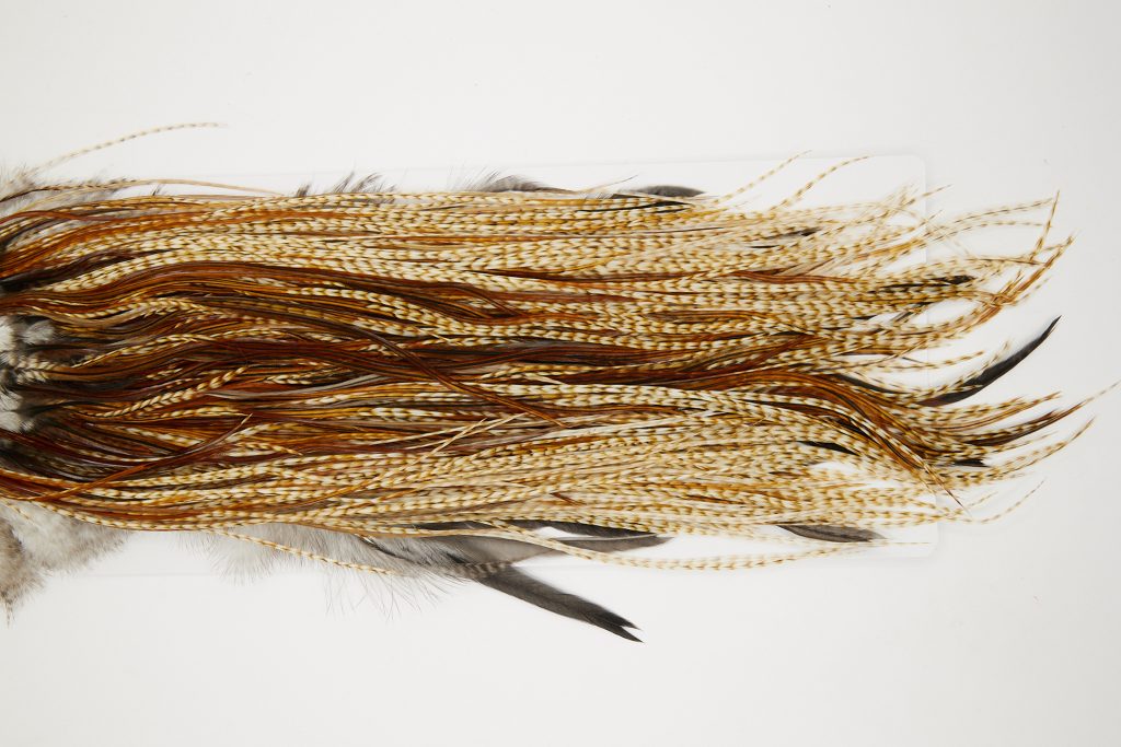 10858 Hebert Dry Fly Hackle Bronze Grade Rooster Saddle Medium Barred Ginger Ties Size 12-16