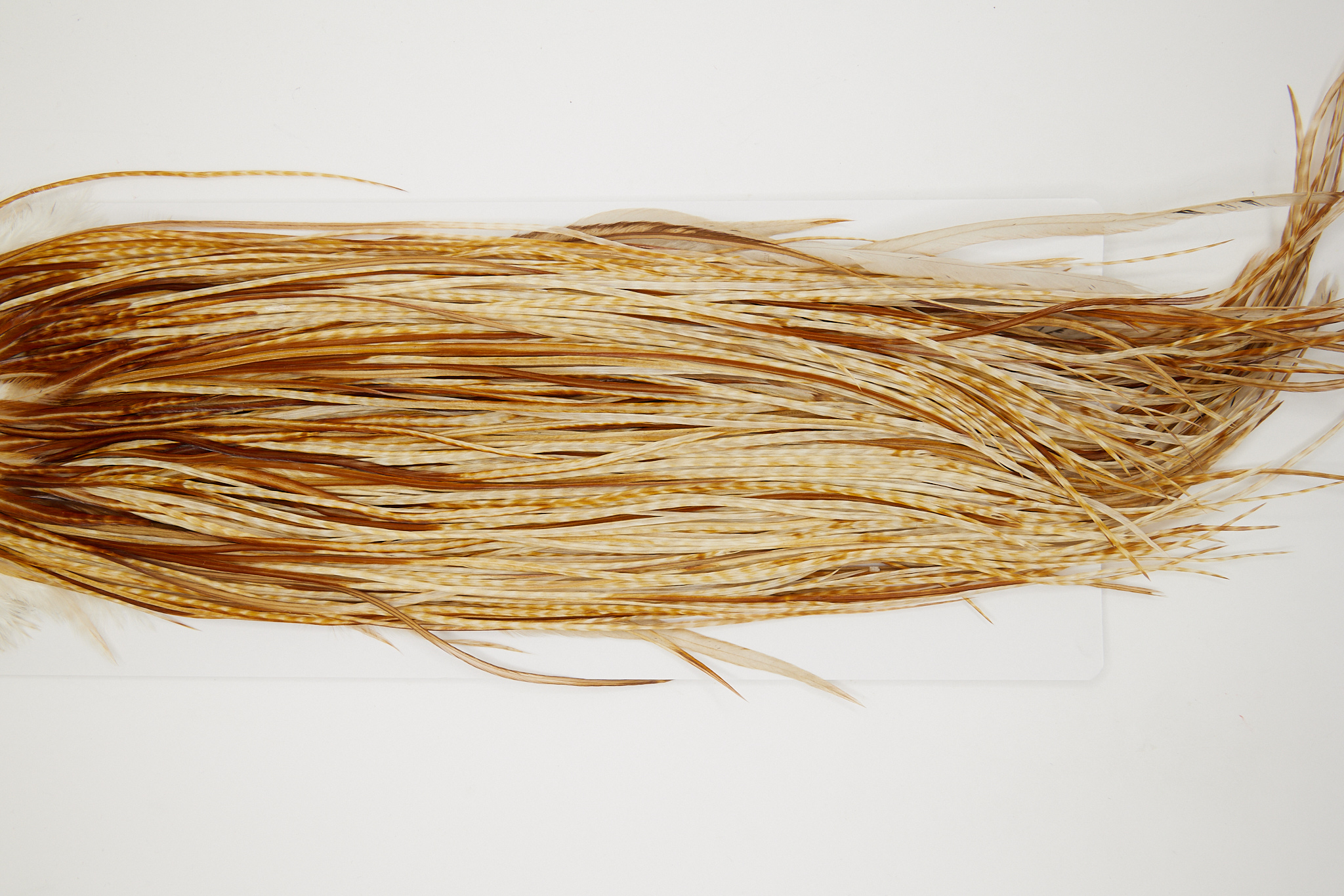 10859 Hebert Dry Fly Hackle Bronze Grade Rooster Saddle Medium Barred Ginger Ties Size 14-16