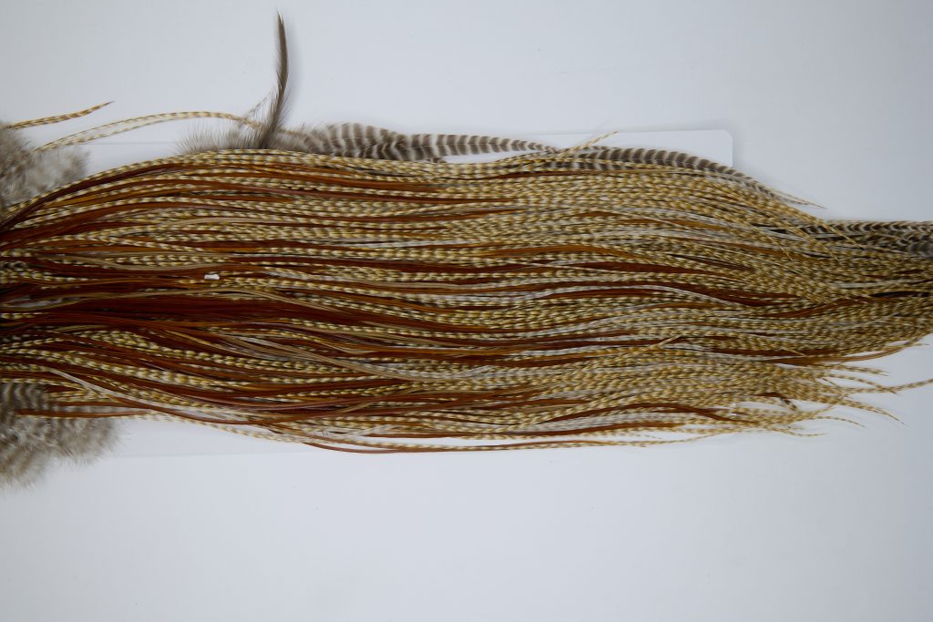 12017 Hebert Dry Fly Hackle Silver Grade Rooster Saddle Medium Barred Ginger Ties Size 14-16