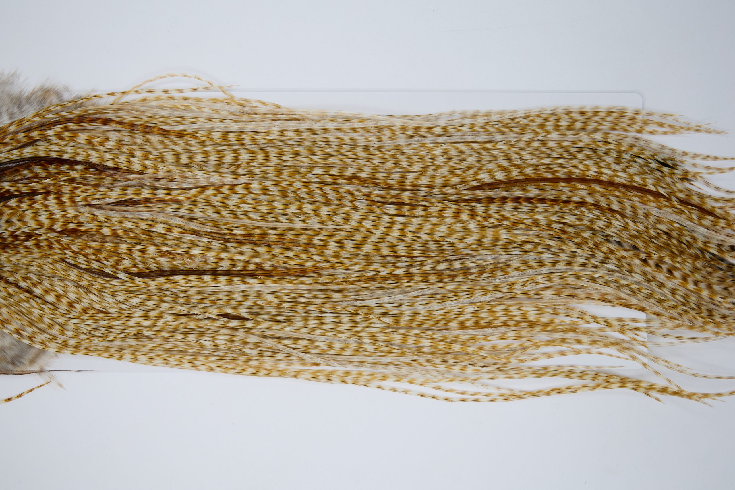 12018 Hebert Dry Fly Hackle Silver Grade Rooster Saddle Medium Barred Ginger Ties Size 12-16