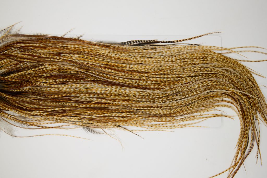 12023 Hebert Dry Fly Hackle Silver Grade Rooster Saddle Medium Barred Ginger Ties Size 12-18