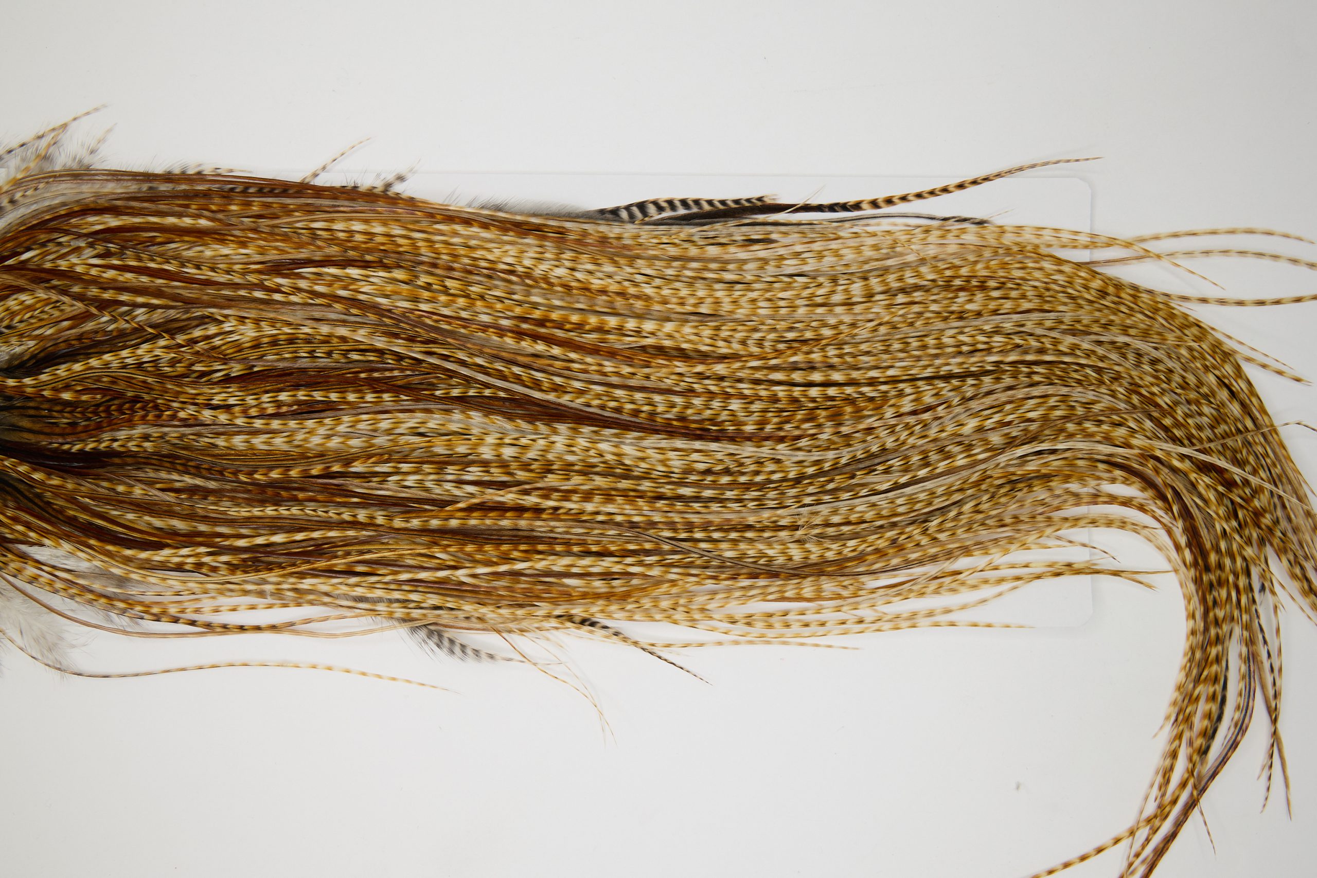 12023 Hebert Dry Fly Hackle Silver Grade Rooster Saddle Medium Barred Ginger Ties Size 12-18